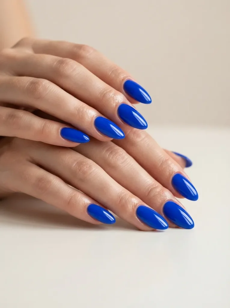 7. electric blue almond nails 202608180508